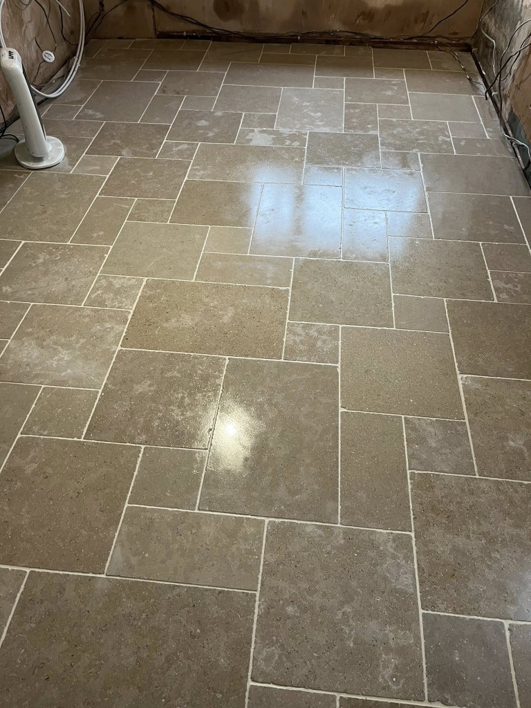 Tumbled limestone floor laid in a modular pattern